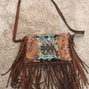 Fringe crossbody purse.